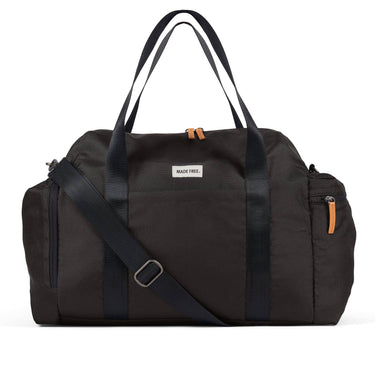 Black duffel bag with a strap on a white background